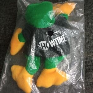 Green and Yellow Plush Toy with Showtime Jacket